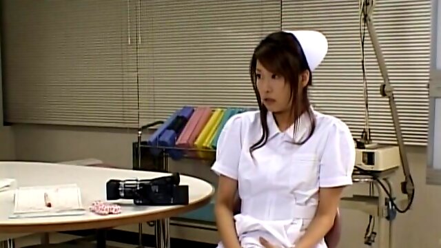 Beautiful Japanese nurse Emiri Aoi spreads her legs to masturbate
