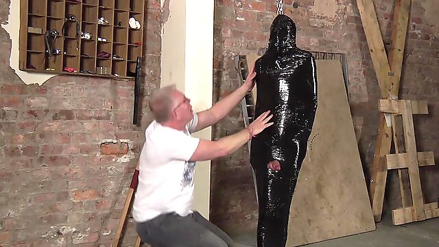 Older perv tied up a younger man to suck his stiff dick. BDSM