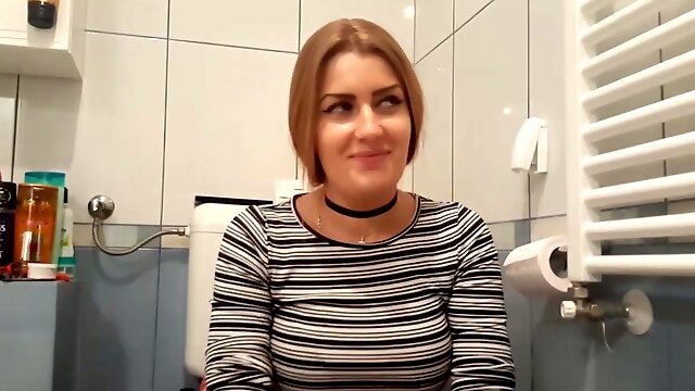 Horny girlfriend getting fucked from behind in a bathroom