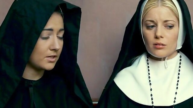 Charlotte Stokely is a horny nun who wants to be seduced by a chick