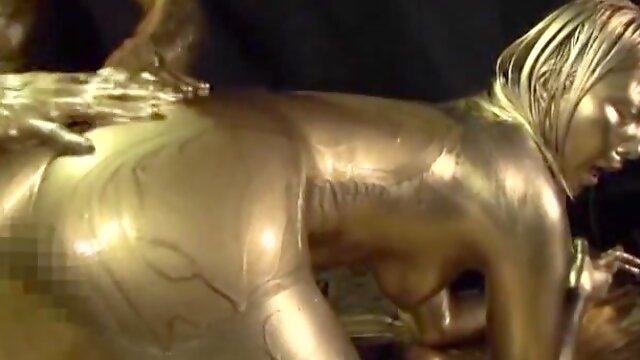 Ai Uehara is a sex slave covered in golden paint before a fuck