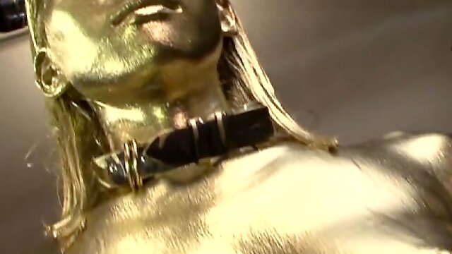 Japanese sex slave covered in golden paint tied to a leash