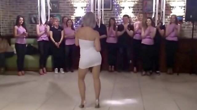 A porn party: sexy blonde in very sexy tight sexy dress dancing