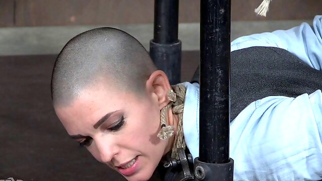 Cutie with shaved head cant believe what the captors are doing to her