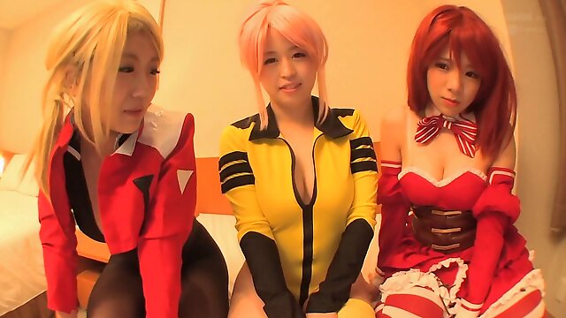 Three Japanese girls in wigs triple suck a guys hard cock