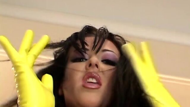 Latex fetish slut does a hard double penetration with two guys