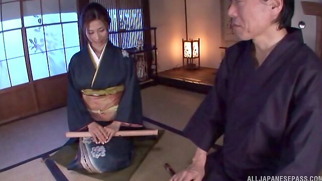 Gorgeous Japanese MILF in traditional clothing receives a hot facial