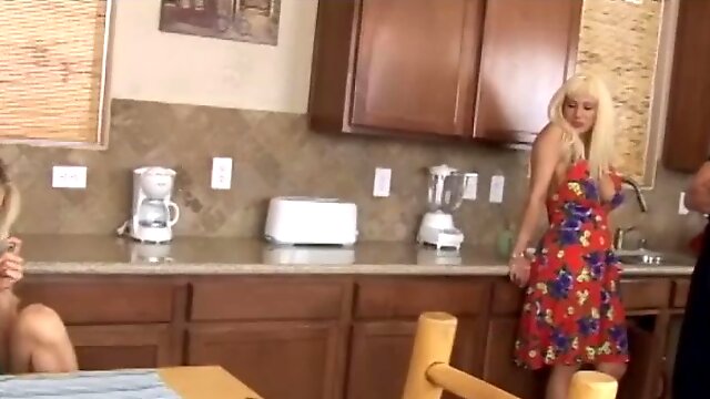 Sexy blonde with long hair getting rough face fucking in the kitchen