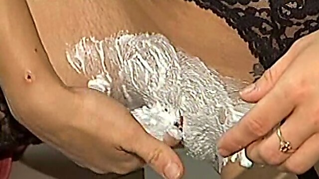 Nasty bitch in stockings shaves her pussy and gets toyed