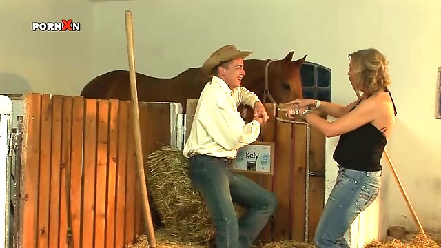 Farmer Momma Gets Fucked By A Cowboy Stud in the Stables