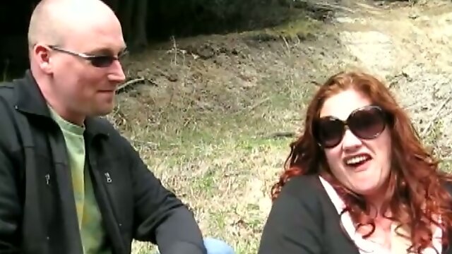 Fat redhead mom plays lesbian games with a slim blonde in a forest