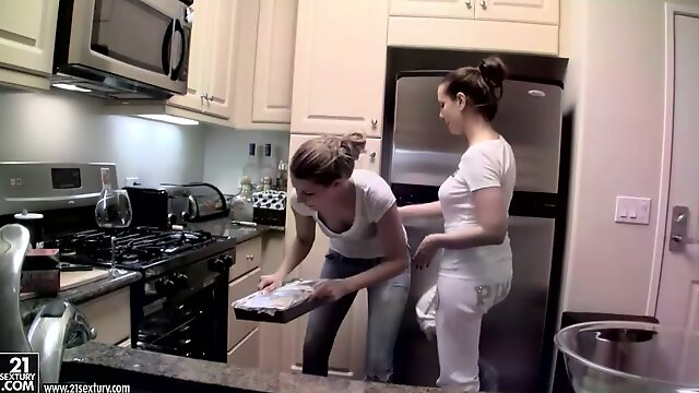 Porn stars cook a meal over a glass of wine