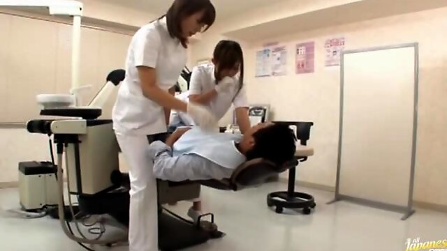 Sexy Asian dentist and her assistant fuck a patient