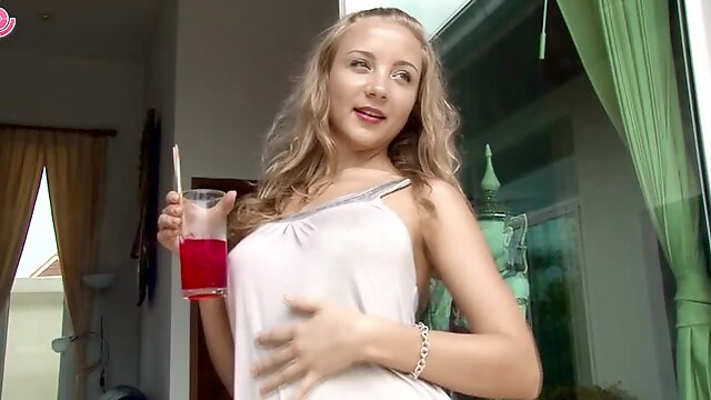 Beautiful blonde masturbates after drinking a cocktail