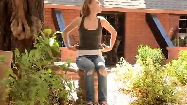 Aubrey is young teen girl walking outdoors she plays with her piss lips