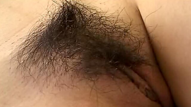 Lovely Japanese Teen Playing with a Sex Toy in Her Hairy Pussy