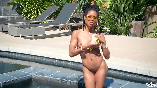 Nude ebony reveals her skinny forms in a stunning outdoor solo by the pool