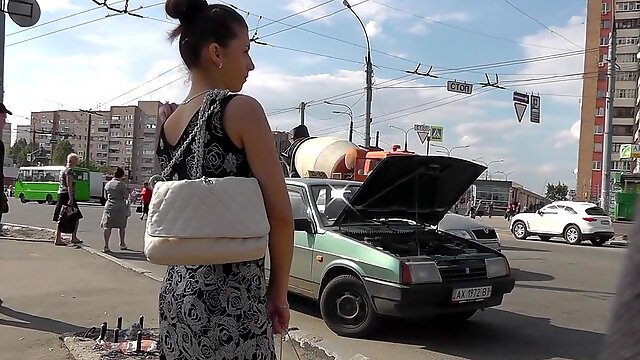 Outdoor scene with a young girl in sexy dress