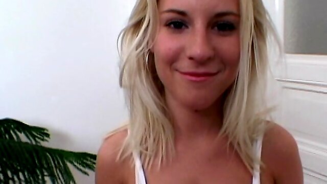 Smiling blonde Nicky Reed is fucking her nice shaved hole