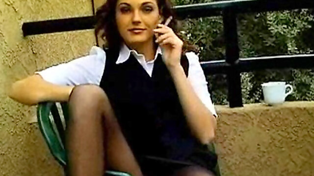 Smoking outdoors in skirt and pantyhose