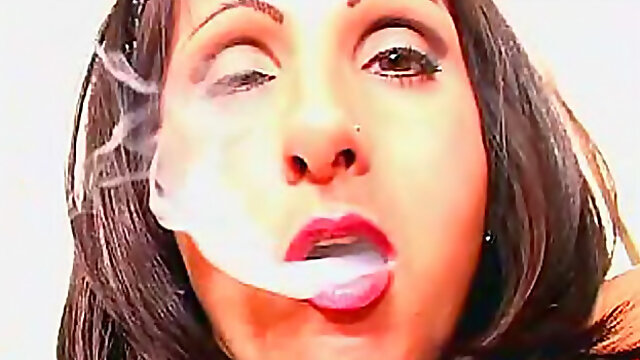 Pierced clitoris brunette girl smokes cigarettes