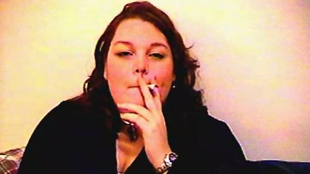 Fat amateur girl smokes cigarette