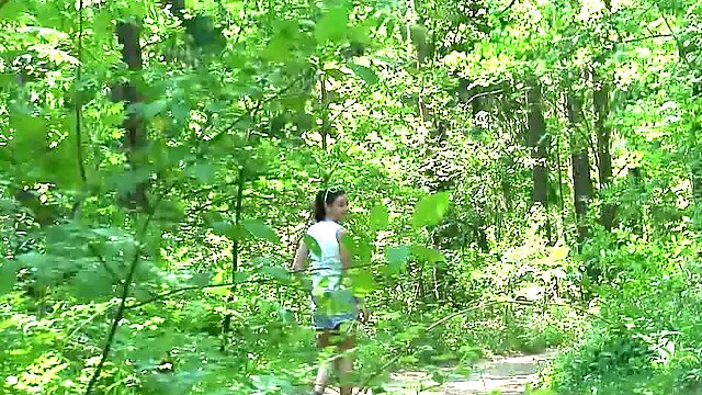 Teenager pees in the woods