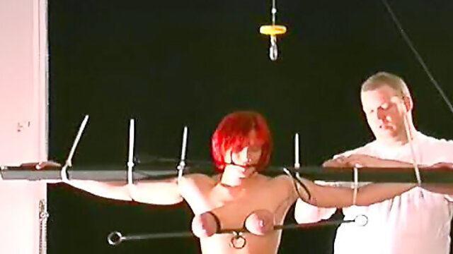 Redhead tied up and ass paddled