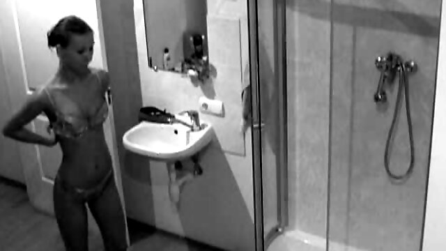 Leggy teen showers on hidden cam