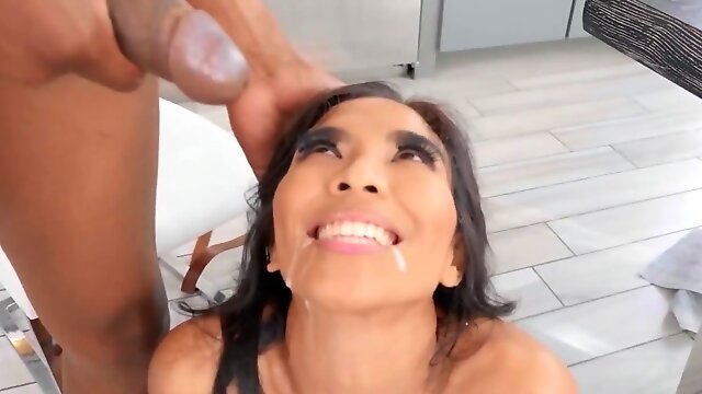 Asian exploits the big black cock for her pussy satisfaction