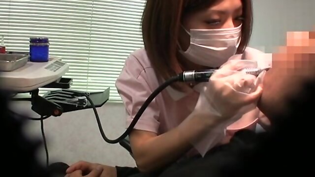 Naughty Japanese dentist gets talked into sucking his hard dick