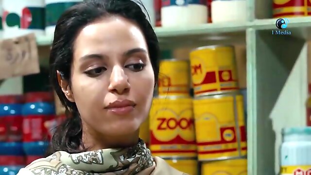 Pretty Arab woman in shop