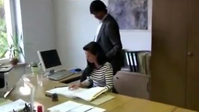 Hot brunette secretary in stockings gets fucked by the boss in the office