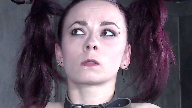 Redhead teen slave Ivy Addams in a painful torture session