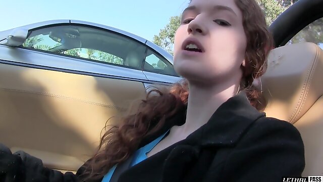 Cute redhead Abbey Rain is curious about a massive tool