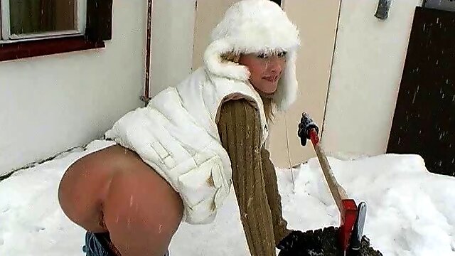 Sweater girl in the snow parts her pussy lips with a toy