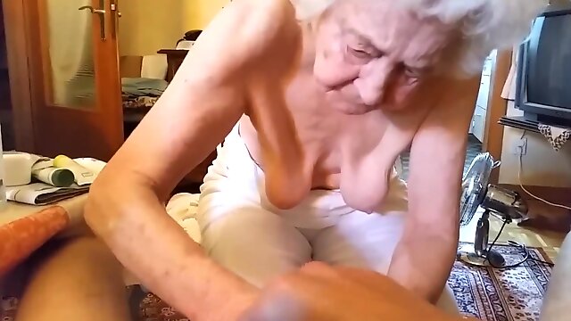 Granny massages a dick