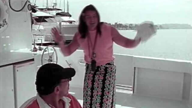 Babe on a boat has a blast while satisfying a couple of men