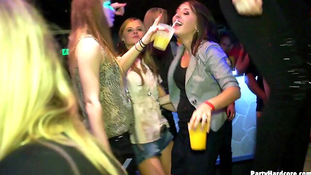 Drinking fuels the night club orgy with gorgeous ladies fucking