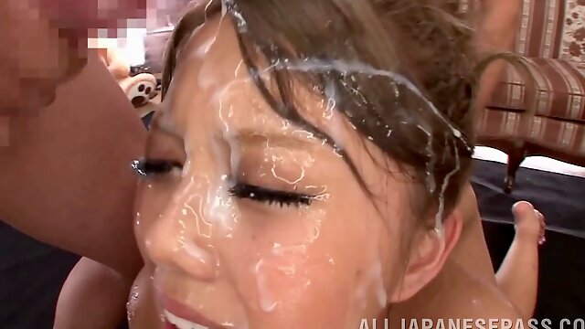 She is on her knees with a face full of cum getting fucked from behind