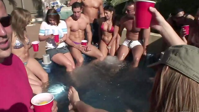 Sexy bitches in jacuzzi licking pussy at the drunken pool party