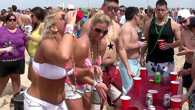 Delightful drunk amateur girls with big tits in bikini getting wild in a party at the beach