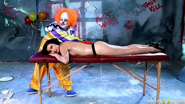 A creepy clown gives this girl a massage then fucks her