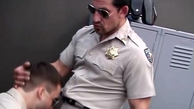 Two gay police officers fuck doggy style at their work place