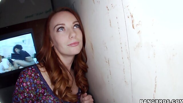 Redhead hussy Dani Jensen milks a gloryhole cock dry into her mouth