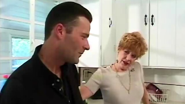 Redhead granny Diane Richards blows and gets fucked in the kitchen
