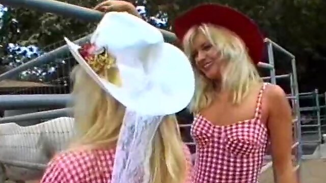 Two hot blonde girls in cowboy hats getting fucked