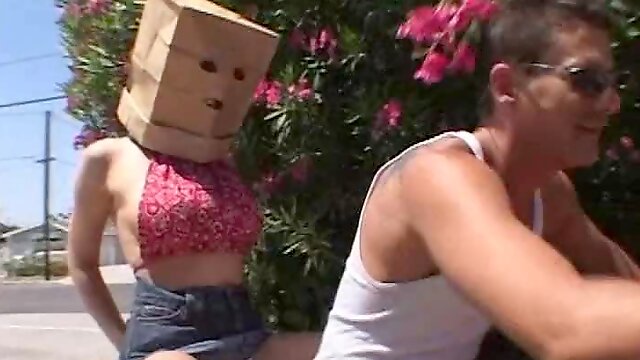 Julie Robbins the sexy girl with a package on her head gets threesomed