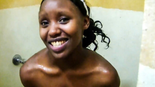 Ebony babe smiles before hardcore pounding in hotel bathroom