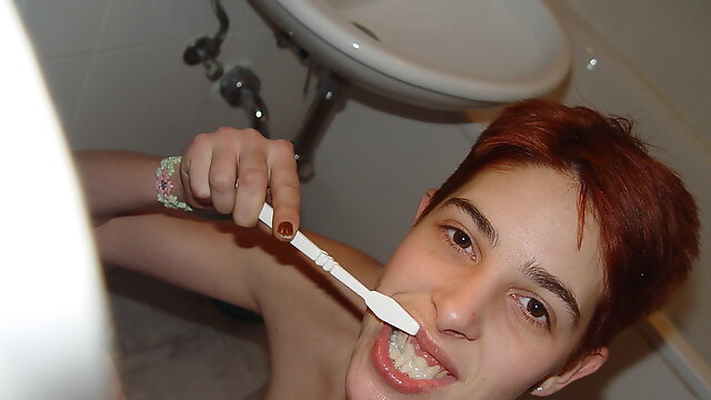 Washing her teeth with Cum and Piss